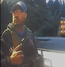 Ring camera footage of ICE agent at Learning Nest Preschool
