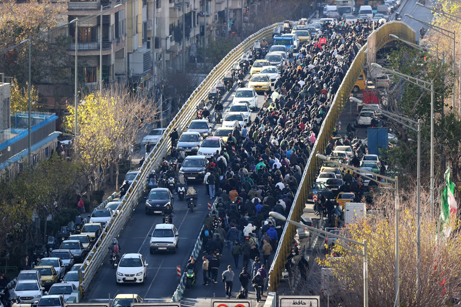 Protesters march in Tehran (ABC News)